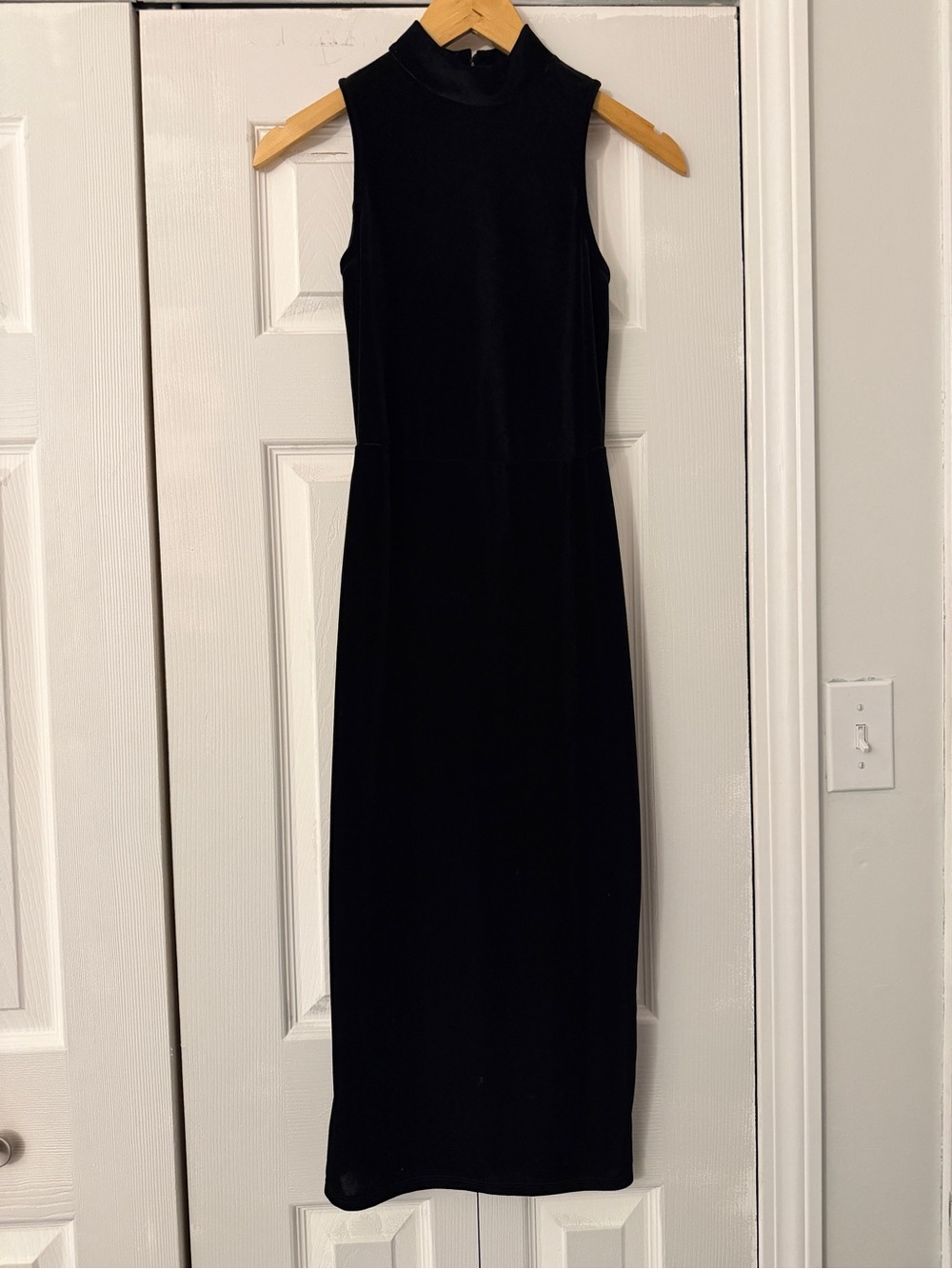 enough about me... Black Sleeveless Mock Neck Maxi Dress